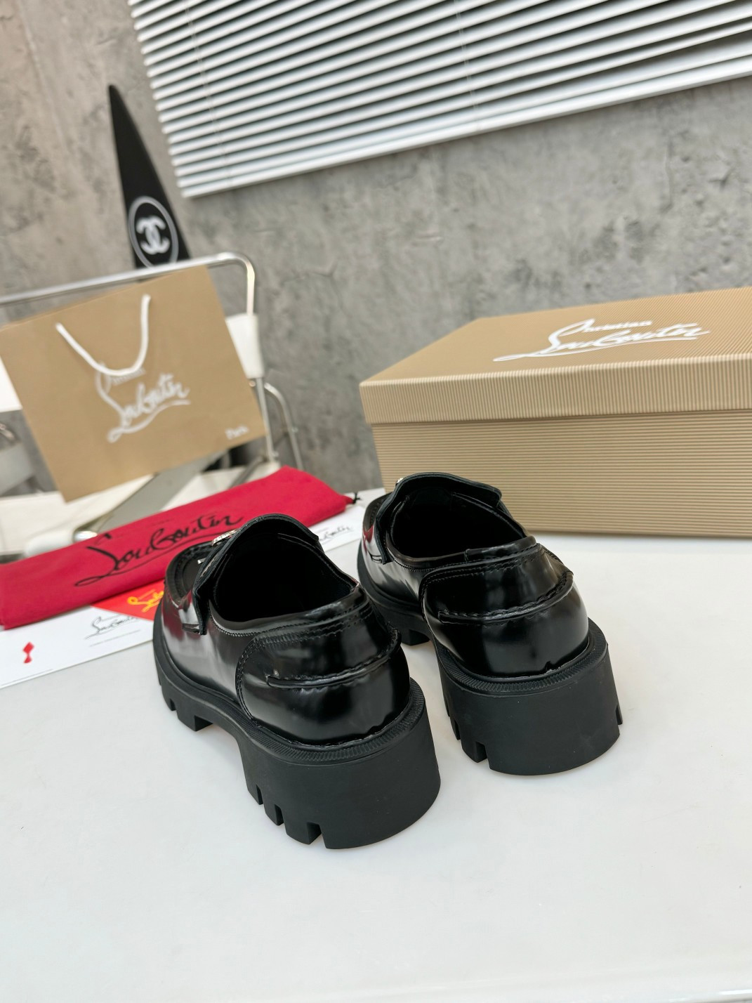 UA Ch**an Louboutin(CL) logo design,the latest runway version of the red-soled shoes