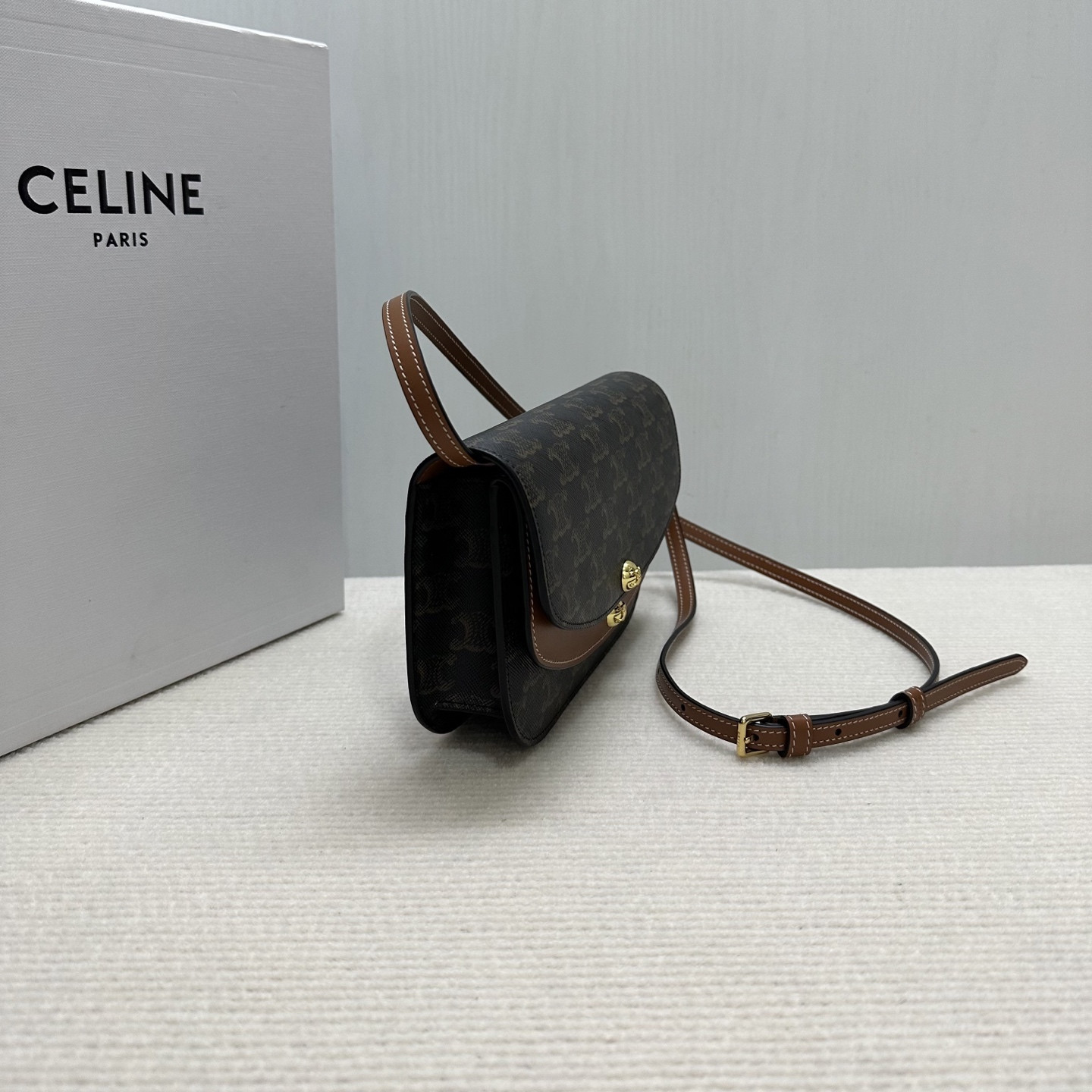 Ce**e duo wallet on strap in triomphe canvas and calfskin 20x13x6cm