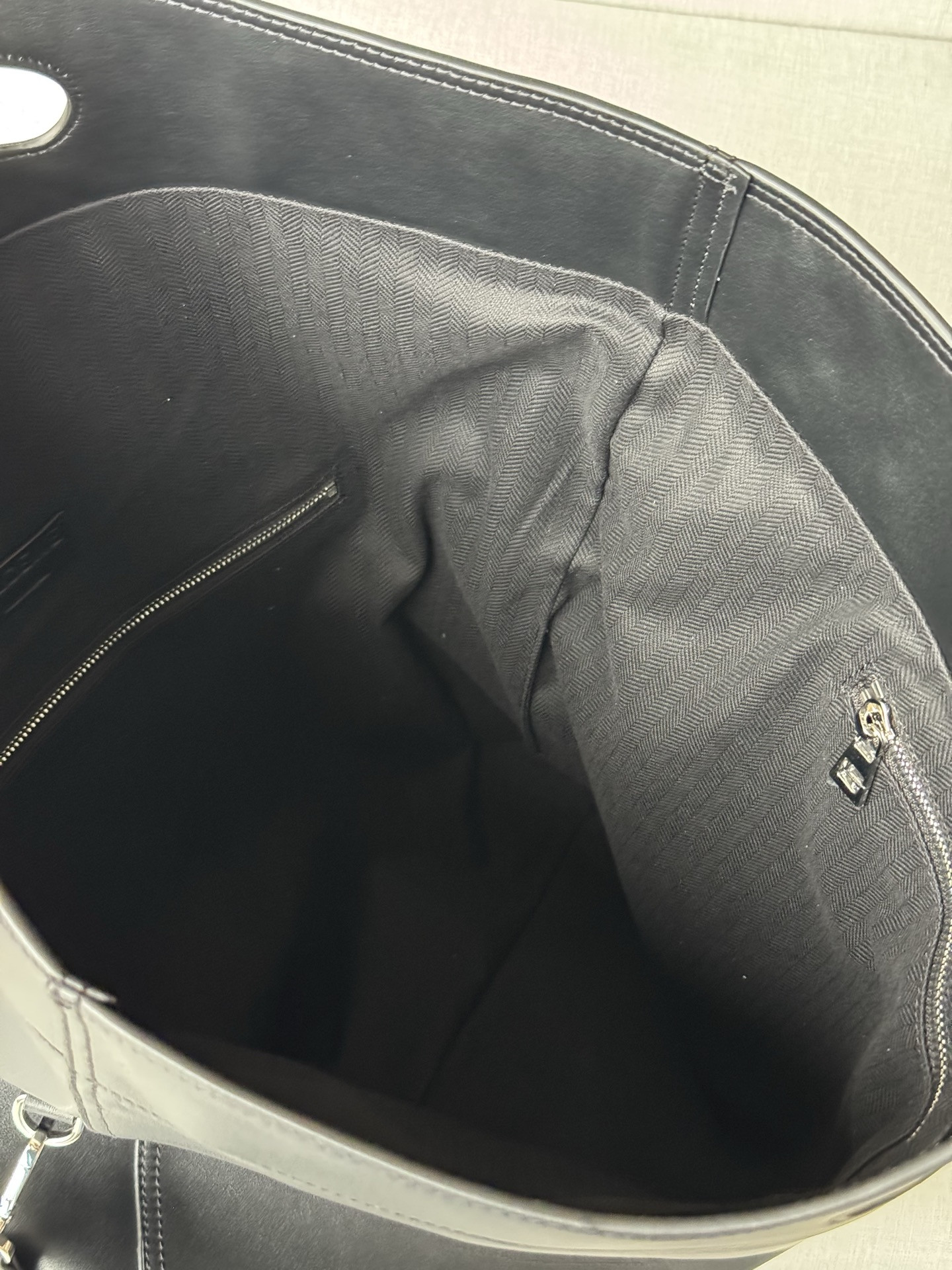 l0ew* bob folded tote in shiny S*pple calfskin