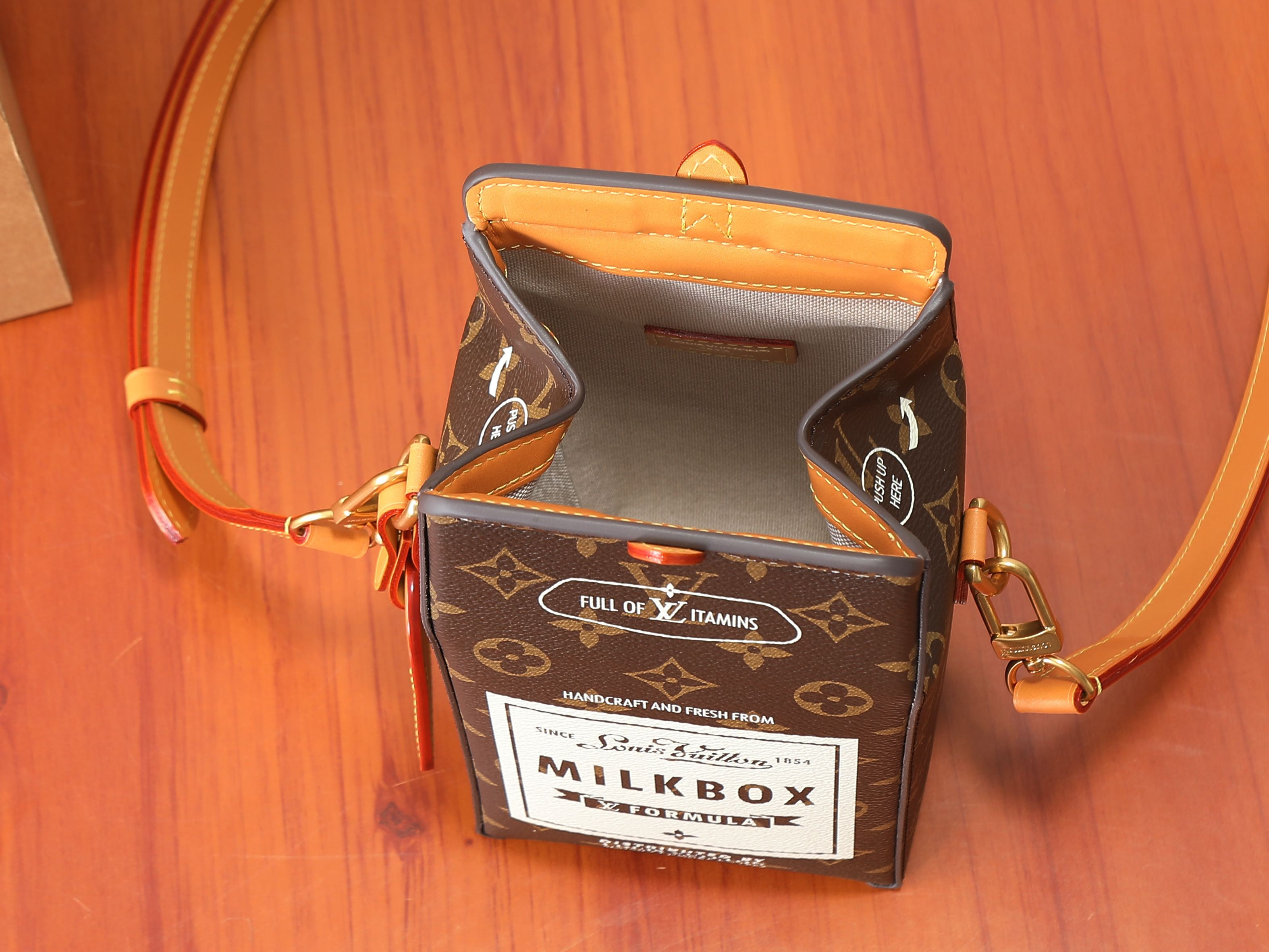 LV Milk Bag M29326 12x22x10cm